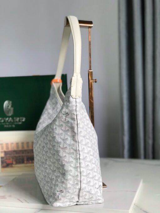 Bohème Hobo Bag. Authentic quality luxury bag crafted in genuine leather comes with authenticity card, dust bag and gift bag. Wander Freely. Carry Elegantly. Introducing the *yard Bohème Hobo Bag—a tribute to Parisian spirit and wanderlust. Inspired by the timber raftsmen’s humble travel pouches, this bag blends heritage storytelling with everyday luxury. Crafted to be exceptionally lightweight and flexible, it drapes effortlessly on your shoulder with a wide, comfortable handle designed for long city strolls or spontaneous weekend escapes. Its beauty lies not only in its sleek silhouette but also in its thoughtful functionality. The secure zip closure keeps your essentials safe, while the removable snap-fastened pouch doubles as a chic clutch or wallet—perfect for a quick dash or stylish switch-up. Whether you’re wandering through cobblestone streets or navigating your daily routine, the Bohème ensures your essentials are always within reach. This is not just a bag—it’s your elegant partner in carefree adventures.