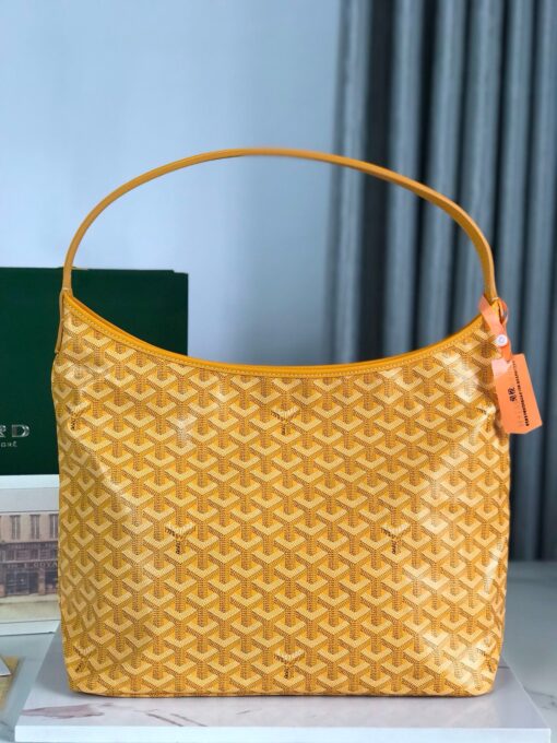 Bohème Hobo Bag. Authentic quality luxury bag crafted in genuine leather comes with authenticity card, dust bag and gift bag. Wander Freely. Carry Elegantly. Introducing the *yard Bohème Hobo Bag—a tribute to Parisian spirit and wanderlust. Inspired by the timber raftsmen’s humble travel pouches, this bag blends heritage storytelling with everyday luxury. Crafted to be exceptionally lightweight and flexible, it drapes effortlessly on your shoulder with a wide, comfortable handle designed for long city strolls or spontaneous weekend escapes. Its beauty lies not only in its sleek silhouette but also in its thoughtful functionality. The secure zip closure keeps your essentials safe, while the removable snap-fastened pouch doubles as a chic clutch or wallet—perfect for a quick dash or stylish switch-up. Whether you’re wandering through cobblestone streets or navigating your daily routine, the Bohème ensures your essentials are always within reach. This is not just a bag—it’s your elegant partner in carefree adventures.