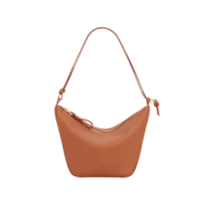 Mini Hammock Hobo. Authentic quality luxury bag crafted in genuine leather comes with authenticity card, dust bag and gift bag. Effortless Form, Everyday Function. The Mini Hammock Hobo is a contemporary reimagining of *oewe’s iconic Hammock bag. This streamlined variation offers a sleek, sculptural silhouette designed as a versatile sling bag for modern living. Expertly crafted in classic calfskin, it features soft, supple leather and a compact form that adapts effortlessly to your day. The unique design allows for multiple carry options—wear it crossbody, over the shoulder, or by hand. Elegant yet functional, this mini hobo is perfect for essentials, making it an ideal choice for both daily wear and minimalist style statements.