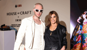 Carine Roitfeld posing at the Dior exhibition in New York sponsored by UBS