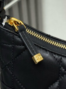 Cigale Mini Bag. Authentic quality luxury bag crafted in genuine leather comes with authenticity card, dust bag and gift bag. A Contemporary Classic in the Making. Meet the latest gem in the Miss Caro line: the *ior Cigale Mini Bag—a sleek, structured piece that blends timeless elegance with modern attitude. Crafted in supple lambskin and elevated by bold Macrocannage topstitching, this petite powerhouse exudes refined femininity from every angle. The standout tonal strap, adorned with an antique gold-finish CD signature, adds a sculptural touch to its streamlined silhouette. A secure zip compartment keeps your essentials close, while the adjustable leather strap offers effortless over-the-shoulder chic. Lightweight, luxurious, and unmistakably *ior—this is the mini bag that delivers big on style. Miss Caro’s modern muse has arrived. | PURSE POP UP LIVE Cigale Mini Bag. Authentic quality luxury bag crafted in genuine leather comes with authenticity card, dust bag and gift bag. A Contemporary Classic in the Making. Meet the latest gem in the Miss Caro line: the *ior Cigale Mini Bag—a sleek, structured piece that blends timeless elegance with modern attitude. Crafted in supple lambskin and elevated by bold Macrocannage topstitching, this petite powerhouse exudes refined femininity from every angle. The standout tonal strap, adorned with an antique gold-finish CD signature, adds a sculptural touch to its streamlined silhouette. A secure zip compartment keeps your essentials close, while the adjustable leather strap offers effortless over-the-shoulder chic. Lightweight, luxurious, and unmistakably *ior—this is the mini bag that delivers big on style. Miss Caro’s modern muse has arrived.