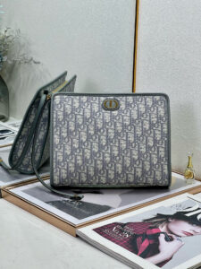 30 Montaigne Dea Pouch. Authentic quality luxury bag crafted in genuine leather comes with authenticity card, dust bag and gift bag. Effortless Elegance, Perfectly Packaged. Elevate your everyday with the 30 Montaigne Dea pouch- where timeless Dior heritage meets modern utility.Expertly crafted in iconic *ior Oblique jacquard and finished with the elegant CD signature, this pouch is more than just an accessory — it’s a statement. Its spacious interior offers room for your essentials, while the structured silhouette transitions effortlessly from clutch to organizer within your *ior Book Tote. Whether carried solo or nested in your favorite bag, the Dea pouch is your answer to understated sophistication with unmistakable style.