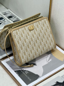 30 Montaigne Dea Pouch. Authentic quality luxury bag crafted in genuine leather comes with authenticity card, dust bag and gift bag. Effortless Elegance, Perfectly Packaged. Elevate your everyday with the 30 Montaigne Dea pouch- where timeless Dior heritage meets modern utility.Expertly crafted in iconic *ior Oblique jacquard and finished with the elegant CD signature, this pouch is more than just an accessory — it’s a statement. Its spacious interior offers room for your essentials, while the structured silhouette transitions effortlessly from clutch to organizer within your *ior Book Tote. Whether carried solo or nested in your favorite bag, the Dea pouch is your answer to understated sophistication with unmistakable style.