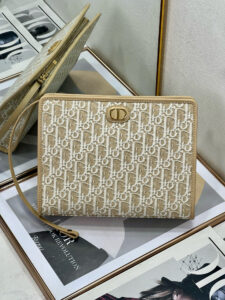 30 Montaigne Dea Pouch. Authentic quality luxury bag crafted in genuine leather comes with authenticity card, dust bag and gift bag. Effortless Elegance, Perfectly Packaged. Elevate your everyday with the 30 Montaigne Dea pouch- where timeless Dior heritage meets modern utility.Expertly crafted in iconic *ior Oblique jacquard and finished with the elegant CD signature, this pouch is more than just an accessory — it’s a statement. Its spacious interior offers room for your essentials, while the structured silhouette transitions effortlessly from clutch to organizer within your *ior Book Tote. Whether carried solo or nested in your favorite bag, the Dea pouch is your answer to understated sophistication with unmistakable style.