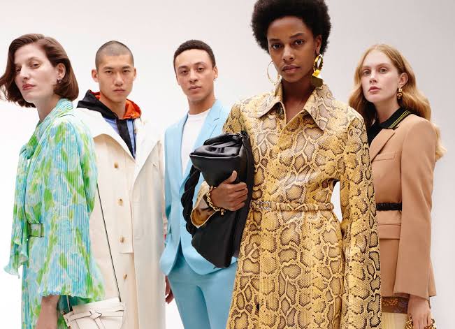 High fashion meets diversity and bold statements in this striking modern editorial, showcasing power dressing at its finest.