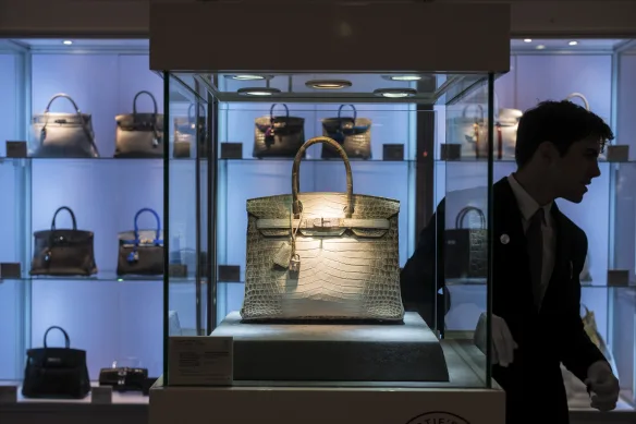 A rare crocodile Birkin takes center stage in a display of elusive luxury.