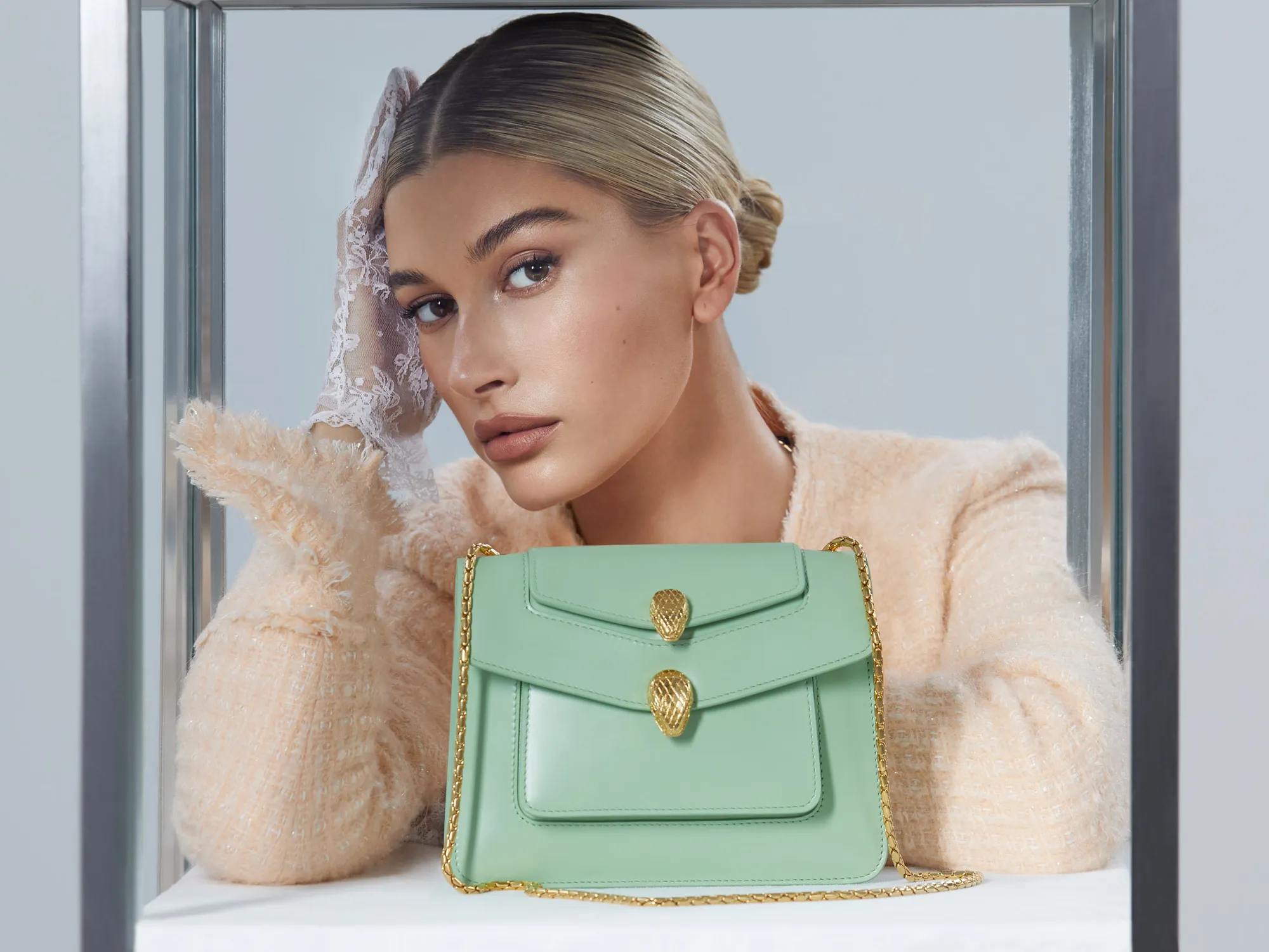 Effortless hands-free chic: the BULGARI Belt Bag styled crossbody for a modern edge.