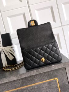 Mini Handy CC Flap Bag. Authentic quality luxury bag crafted in genuine leather comes with authenticity card, dust bag and gift bag. Small in Size, Grand in Glamour — The Essence of Elegance. Petite yet powerful, the Caviar Quilted Mini Handy CC Flap embodies timeless sophistication. Crafted from signature caviar leather with classic diamond quilting, this bag exudes refined elegance in every stitch. The design features a structured top handle and a leather-threaded chain strap, offering versatile styling from hand-carry to crossbody. Gold-plated CC details and the signature turn-lock closure add the perfect touch of luxury. Inside, a sleek leather interior with both zipper and patch pockets ensures your essentials stay beautifully organized. Compact, iconic, and unmistakably *ANEL — this is the ultimate statement in modern classic style.