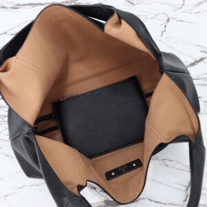 Softbit Maxi Shoulder Bag. Authentic quality luxury bag crafted in genuine leather comes with authenticity card, dust bag and gift bag. Icon Reimagined: Effortless Luxury with a Modern Bit of Bold. Gucci’s timeless heritage meets contemporary ease in the new Softbit Shoulder Bag. Crafted from supple grained leather with a luxuriously rich texture, this piece balances sophistication and function effortlessly. At its heart lies an oversized half-horsebit — a bold reinterpretation of the House’s iconic detail — accenting the magnetic closure with statement appeal. With its relaxed silhouette and refined craftsmanship, the Softbit is the perfect companion for those who favor effortless elegance with a modern edge.