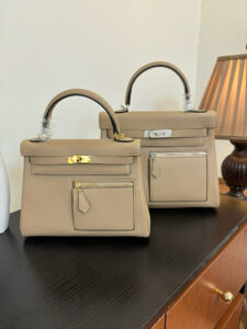 Kelly Colormatic. Authentic quality luxury bag crafted in genuine leather comes with authenticity card, dust bag and gift bag. Where Classic Kelly Meets Colourful Genius. Hand-crafted from ultra-smooth Swift leather and finished with radiant gold hardware, this exceptional limited-edition masterpiece brings a fresh, artistic twist to the iconic Kelly silhouette. Its cleverly designed front pocket opens wide with a single gusset for effortless access, while the rear flap pocket keeps your daily essentials—especially your most-used cards—right at your fingertips. The asymmetric yet perfectly balanced colour combination highlights the haute craftsmanship *rmès is celebrated for, turning every stitch into a statement. A collector’s dream and a style enthusiast’s delight, the Kelly Colormatic is sophistication with a spark—functional, vibrant, and unmistakably *rmès.