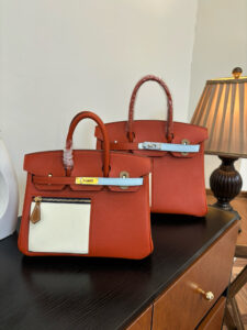 Swift Colormatic Uni Birkin. Authentic quality luxury bag crafted in genuine leather comes with authenticity card, dust bag and gift bag. Where Color Meets Craft — The Art of Birkin Reimagined. The Swift Colormatic Uni Birkin is a rare masterpiece of craftsmanship and color harmony. Expertly handcrafted from luxuriously soft Swift leather, this special-order Birkin reimagines classic sophistication with a playful, modern twist. Its thoughtful design includes a front zipper pocket, rear flat pocket, and the iconic short crossover flap secured by a signature turn-lock closure. Inside, a supple leather interior with both zipper and patch pockets ensures your essentials are beautifully organized. From its smooth texture to its meticulous detailing, the Swift Colormatic Uni Birkin is more than a handbag — it’s an exclusive statement of individuality and timeless *rmès artistry.