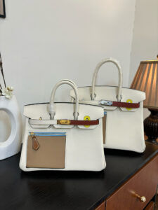 Swift Colormatic Uni Birkin. Authentic quality luxury bag crafted in genuine leather comes with authenticity card, dust bag and gift bag. Where Color Meets Craft — The Art of Birkin Reimagined. The Swift Colormatic Uni Birkin is a rare masterpiece of craftsmanship and color harmony. Expertly handcrafted from luxuriously soft Swift leather, this special-order Birkin reimagines classic sophistication with a playful, modern twist. Its thoughtful design includes a front zipper pocket, rear flat pocket, and the iconic short crossover flap secured by a signature turn-lock closure. Inside, a supple leather interior with both zipper and patch pockets ensures your essentials are beautifully organized. From its smooth texture to its meticulous detailing, the Swift Colormatic Uni Birkin is more than a handbag — it’s an exclusive statement of individuality and timeless *rmès artistry.