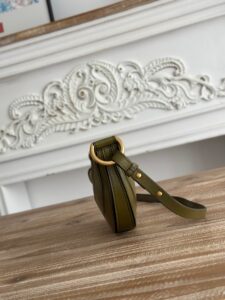 Banana Cross-Body Bag.  Authentic quality luxury bag crafted in genuine leather comes with authenticity card, dust bag and gift bag. Playful Design, Iconic Craftsmanship Meet your new style statement: the *LOÉ Banana, a charming cross-body bag crafted from luxurious shiny grained calfskin. Inspired by *loé’s legendary Spring 2001 collection, its sculptural, banana-shaped silhouette highlights the Maison’s signature artistry with a refined 3D textured effect. Perfectly sized to hold your phone, cardholder, and daily essentials, this lighthearted yet sophisticated accessory blends practicality with Parisian elegance. An adjustable strap allows effortless shoulder or crossbody wear, making it your go-anywhere companion.