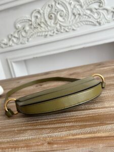 Banana Cross-Body Bag.  Authentic quality luxury bag crafted in genuine leather comes with authenticity card, dust bag and gift bag. Playful Design, Iconic Craftsmanship Meet your new style statement: the *LOÉ Banana, a charming cross-body bag crafted from luxurious shiny grained calfskin. Inspired by *loé’s legendary Spring 2001 collection, its sculptural, banana-shaped silhouette highlights the Maison’s signature artistry with a refined 3D textured effect. Perfectly sized to hold your phone, cardholder, and daily essentials, this lighthearted yet sophisticated accessory blends practicality with Parisian elegance. An adjustable strap allows effortless shoulder or crossbody wear, making it your go-anywhere companion.