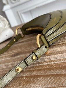 Banana Cross-Body Bag.  Authentic quality luxury bag crafted in genuine leather comes with authenticity card, dust bag and gift bag. Playful Design, Iconic Craftsmanship Meet your new style statement: the *LOÉ Banana, a charming cross-body bag crafted from luxurious shiny grained calfskin. Inspired by *loé’s legendary Spring 2001 collection, its sculptural, banana-shaped silhouette highlights the Maison’s signature artistry with a refined 3D textured effect. Perfectly sized to hold your phone, cardholder, and daily essentials, this lighthearted yet sophisticated accessory blends practicality with Parisian elegance. An adjustable strap allows effortless shoulder or crossbody wear, making it your go-anywhere companion.