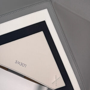 Medium Puzzle Fold Tote.  Authentic quality luxury bag crafted in genuine leather comes with authenticity card, dust bag and gift bag. Modern art meets effortless luxury. This exceptional piece reimagines the iconic Puzzle Fold silhouette with a lightweight geometric structure that folds completely flat, making it the ultimate travel companion. Crafted in supple nappa calfskin, the tote features exquisite leather marquetry squares inspired by Josef Albers’s celebrated Homage to the Square series. Each panel reflects precision, balance, and *OEWE’s unmatched craftsmanship, transforming a functional tote into a wearable work of art. Part of the exclusive *OEWE x Albers collection, this medium Puzzle Fold tote blends practicality with cultural sophistication, offering spacious elegance for everyday moments, weekend escapes, and artful adventures. A collectible masterpiece—crafted for the modern collector.