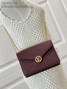 Wallet On Chain Rosy. Authentic quality luxury bag crafted in genuine leather comes with authenticity card, dust bag and gift bag. Rosy Elegance, Effortlessly Carried. Introducing the Wallet On Chain Rosy—a compact statement of modern elegance. Crafted from the House’s signature Monogram Empreinte leather, this chic piece brings timeless sophistication to any outfit. The design shines with a gold-toned LV Circle and a sleek chain strap, offering effortless shoulder carry for day or night. Despite its refined silhouette, the Rosy is smartly sized to hold your everyday must-haves, complete with three secure card slots to keep essentials organized. A perfect blend of luxury, versatility, and iconic craftsmanship—your new go-to accessory for every occasion.