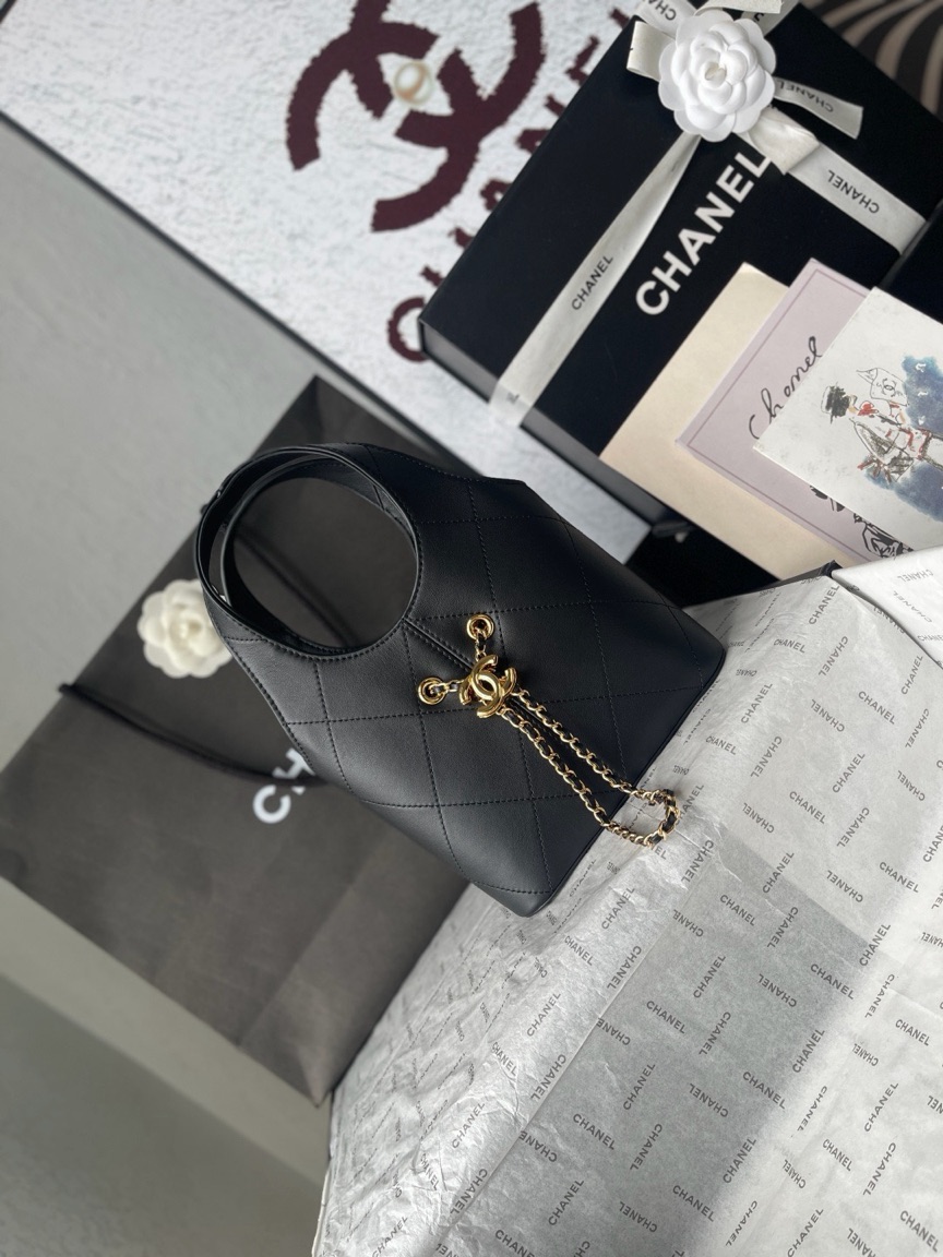 Small Tote 4 Small Tote. Authentic quality luxury bag crafted in genuine leather comes with authenticity card, dust bag and gift bag. Effortless Everyday Luxury. The *ANEL Small Tote from the Spring–Summer 2026 Pre-Collection combines timeless elegance with everyday practicality. Crafted from smooth calfskin in classic black, it features a structured silhouette that is both refined and versatile. Perfectly sized for daily essentials, this compact tote is enhanced by subtle gold-tone hardware for a touch of signature *ANEL sophistication. Whether for work, city outings, or everyday wear, it’s a chic companion designed to elevate every look. Elegant, practical, and effortlessly timeless.