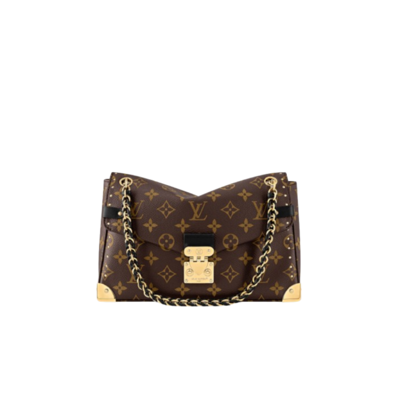 Trunkie. Authentic quality luxury bag crafted in genuine leather comes with authenticity card, dust bag and gift bag. Heritage, Reimagined for Today. A bold tribute to the House’s storied past, the Trunkie brings the spirit of vintage travel into a sleek, modern silhouette. Crafted in iconic Monogram canvas and adorned with 38 gold-toned rivets, it echoes the timeless charm of classic LV trunks. Metallic corners and the signature S-lock closure elevate its structured design, while the sliding chain offers versatile styling—from shoulder to crossbody with effortless ease. Inside, a thoughtfully sized interior with a zipped pocket keeps your essentials perfectly organized. Where history meets modern sophistication, the Trunkie is more than a bag—it’s a statement of enduring luxury.